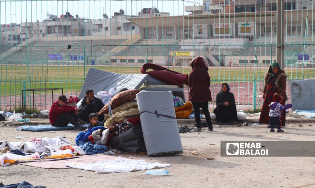 Displaced people await their fate in a stadium in Qamishli - December 11, 2024 (Enab Baladi/Ruba Abbas)