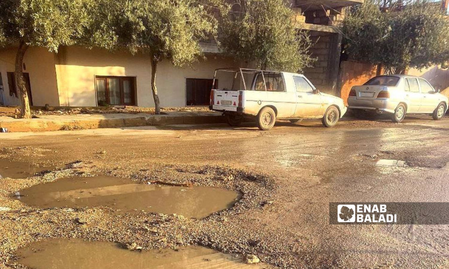 Dilapidated roads filled with potholes in the city of Tal Burak, east of al-Hasakah - January 22, 2025 (Enab Baladi/Majd al-Salem)