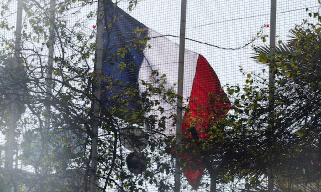 France raises its flag on its embassy building for the first time after the fall of the Assad regime - December 17, 2024 (Reuters)