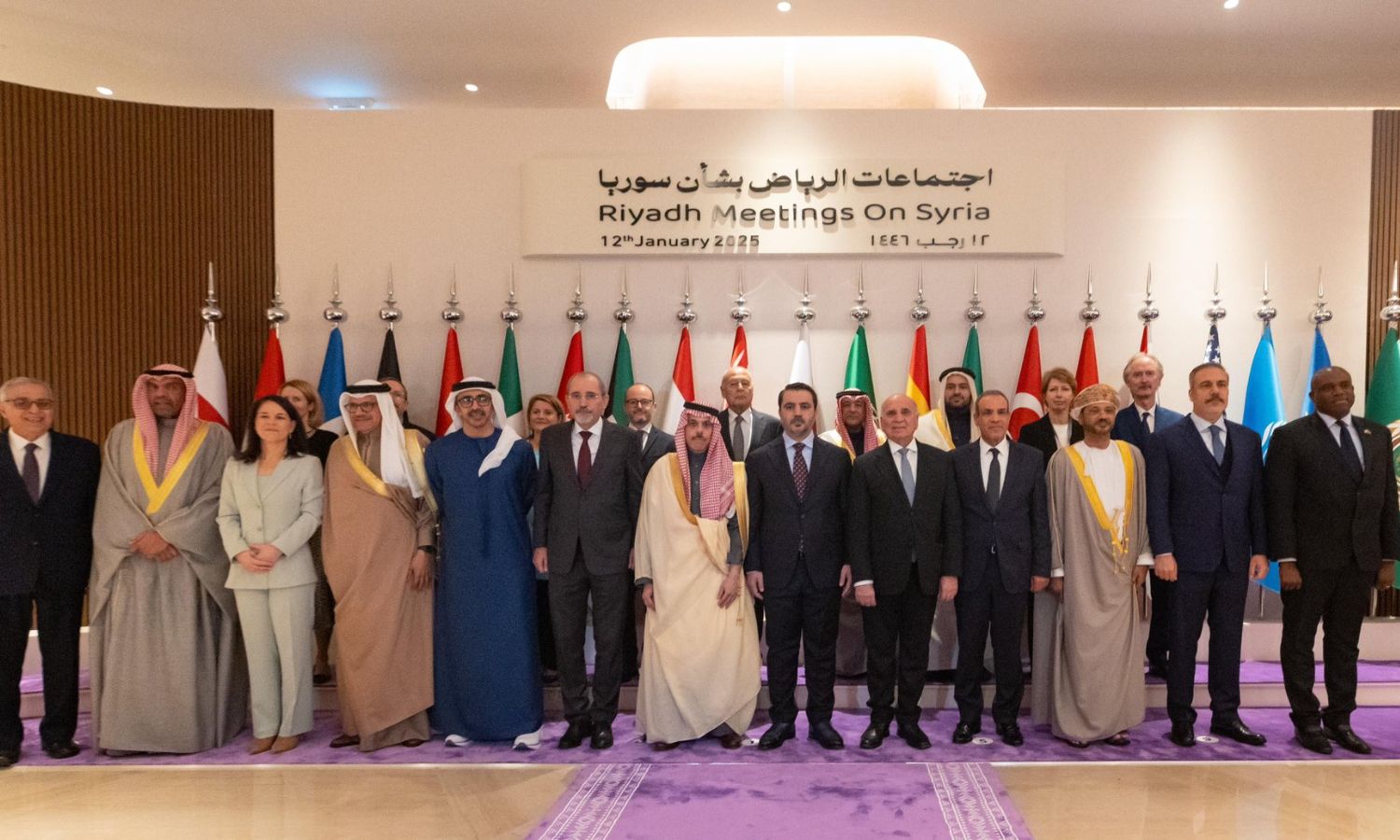 Officials from participating countries in the Riyadh meetings on Syria take a commemorative photo - January 12, 2025 (Saudi Foreign Ministry)