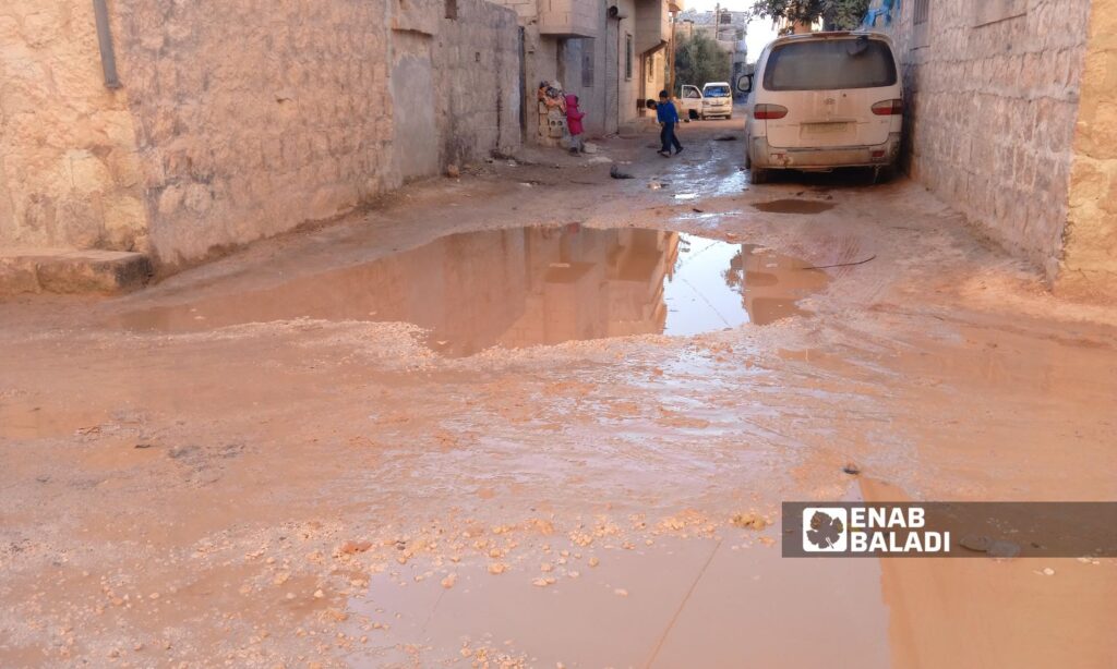 The pothole-ridden roads in al-Dana city cause malfunctions in cars and motorcycles - December 4, 2024 (Enab Baladi/Mohamed Masto)