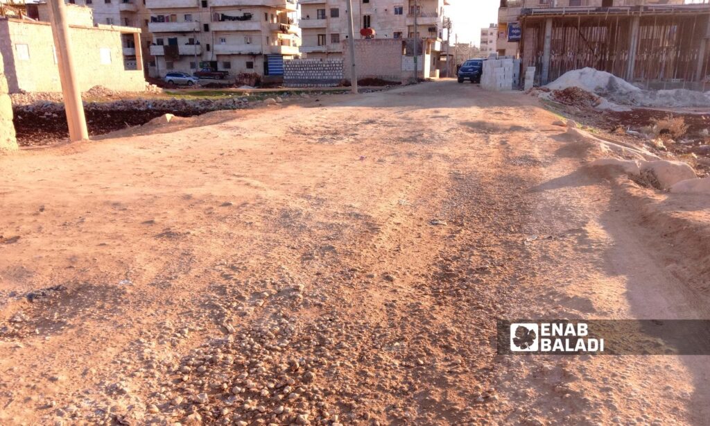 Many pothole-ridden and unpaved roads are spread throughout most of al-Dana city - December 4, 2024 (Enab Baladi/Mohamed Masto)