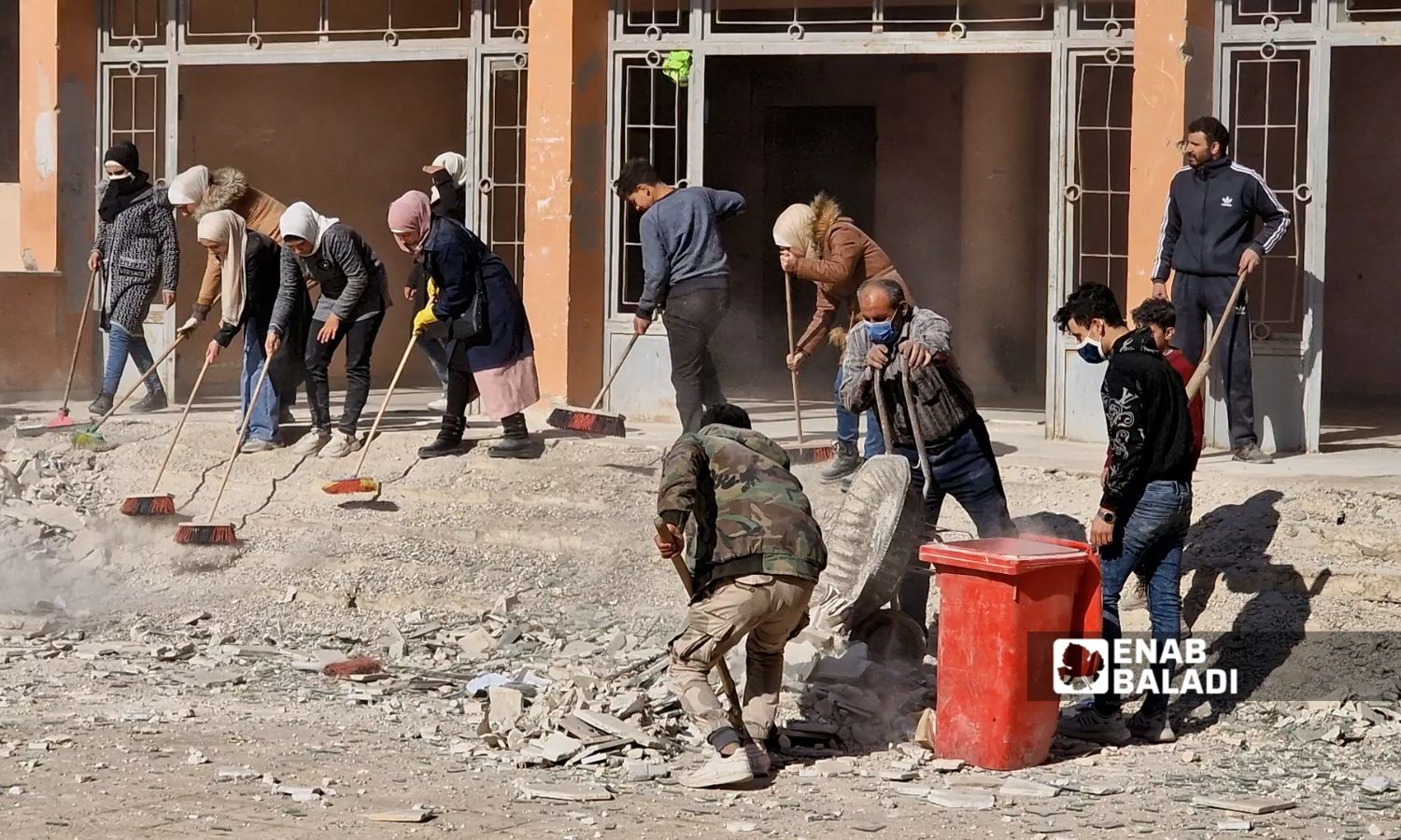 Volunteers remove rubble from Ahmad Leila School in al-Qaboun, Damascus - January 6, 2025 (Enab Baladi/Anas al-Khouli)