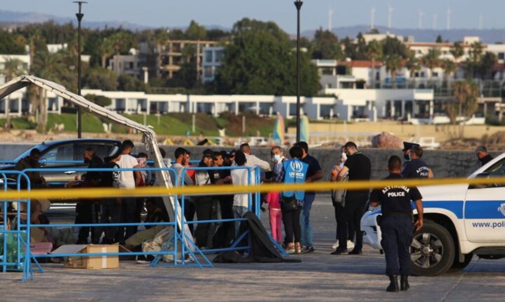 Migrants disembark from a boat at the port of Paphos in Cyprus - November 11, 2021 (Reuters/Yiannis Kourtoglou)