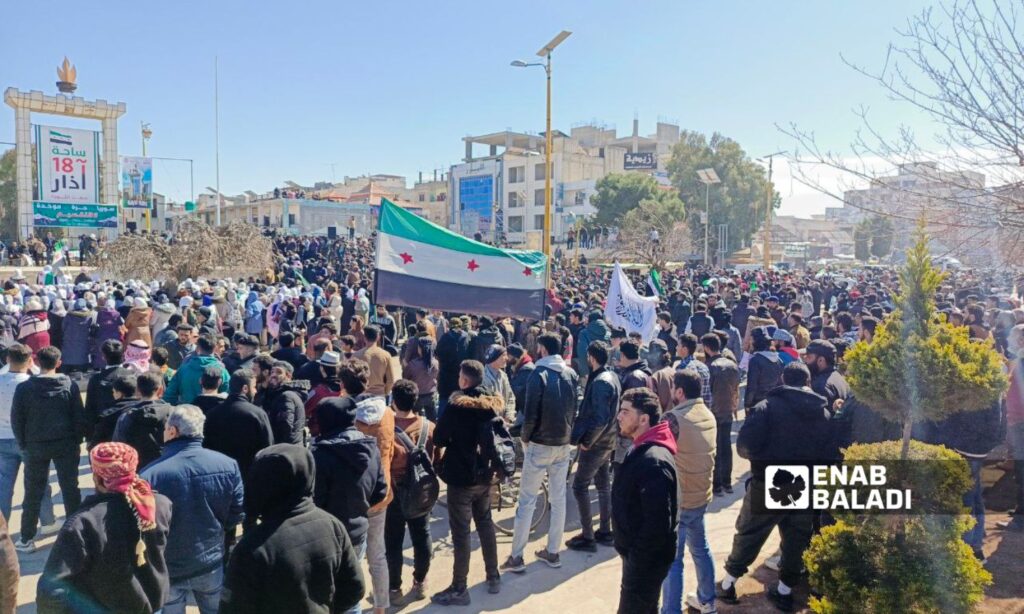 A delegation from As-Suwayda and the occupied Syrian Golan participated in a demonstration held in Daraa al-Balad to denounce the statements of Israeli Prime Minister Benjamin Netanyahu - February 25, 2025 (Enab Baladi/Halim Muhammad)