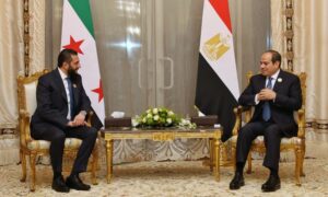 The Syrian transitional president, Ahmed al-Sharaa, meets with Egyptian president Abdel Fattah El-Sisi on the sidelines of the Palestine Summit in Cairo - March 5, 2025 (Syrian Presidency)