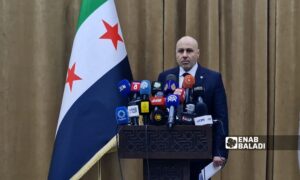 The spokesperson for the fact-finding committee regarding the Syrian coast events, Yasser al-Farhan, during a press conference discussing the progress of the investigation - March 25, 2025 (Enab Baladi)