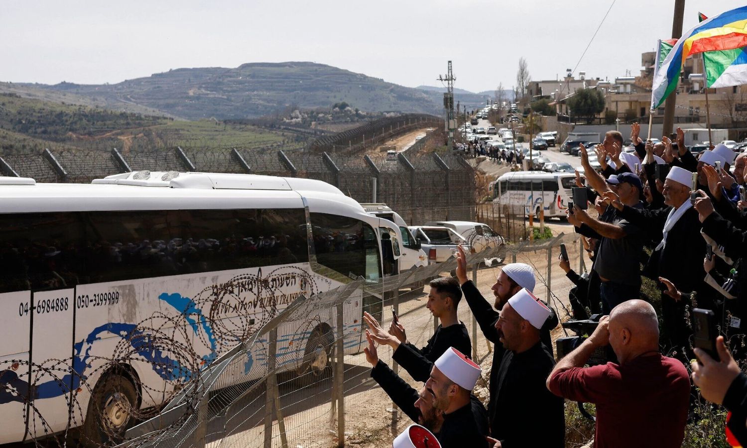 The delegation of Druze religious leaders near the border checkpoint in the village of Majdal Shams in the occupied Golan Heights – March 14, 2025 (AFP)