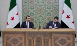 The Syrian transitional president Ahmed al-Sharaa signs the draft constitutional declaration - March 13, 2025 (SANA)