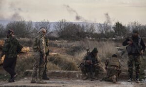 Elements of the Syrian Ministry of Defense in the vicinity of the border village of Housh al-Sayyid Ali, east of Homs - March 17, 2025 (Associated Press)