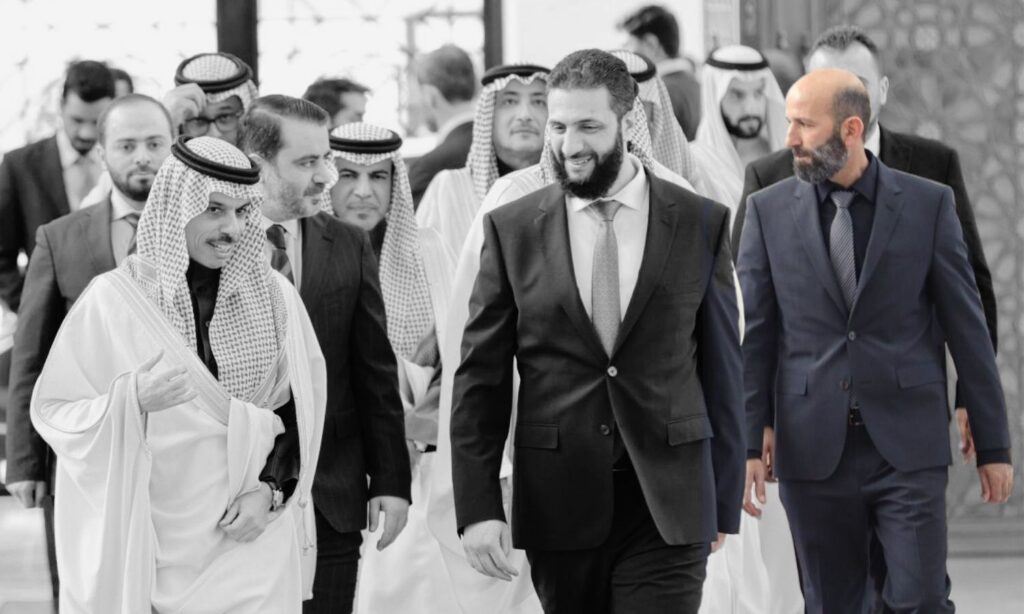 Abdul Rahman Salama, to the left of the Syrian transitional president Ahmed al-Sharaa, receiving Saudi Foreign Minister Faisal bin Farhan - January 24, 2025 (Syrian Presidency)
