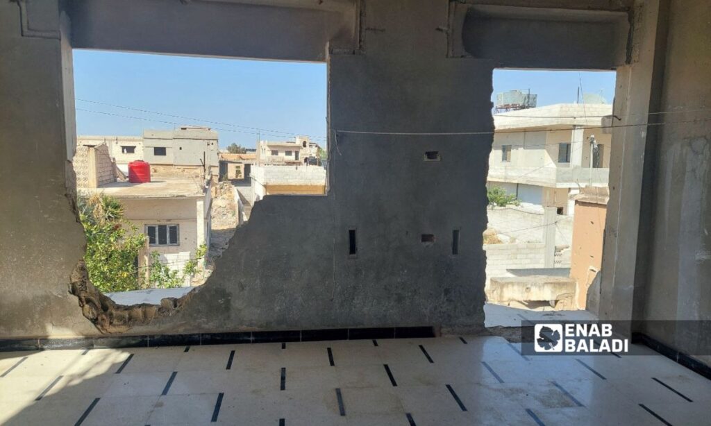 A part of a destroyed house due to the bombardment by the ousted regime has been returned to by its owners for residency after the fall of the regime - April 4, 2025 (Enab Baladi/Jana al-Issa)