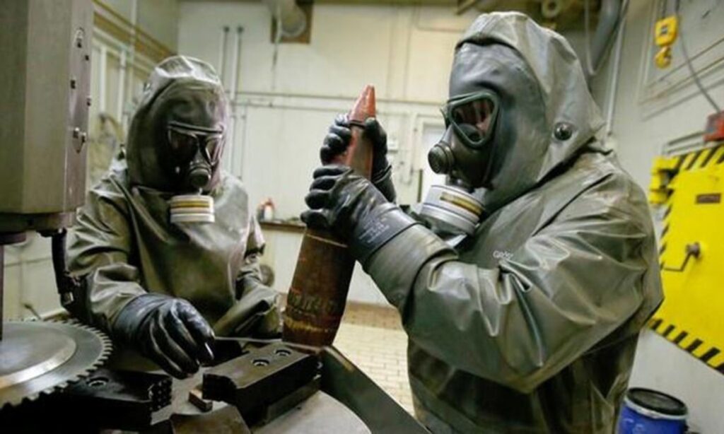 Specialists work on dismantling the Syrian chemical weapons (The Chemical Violations Documentation Center of Syria)