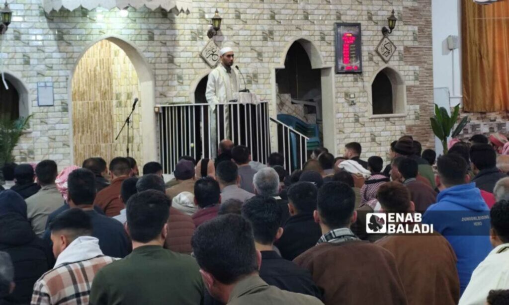 Worshippers attending the Eid prayer sermon in Ras al-Ain, al-Hasakah - March 31, 2025 (Enab Baladi/Hussein Shaabo)