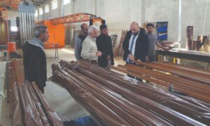 Idlib's Industry Director Ahmad al-Qasem during a visit to an aluminum factory in Eastern Idlib countryside - April 8, 2025 (Ministry of Industry/Telegram)