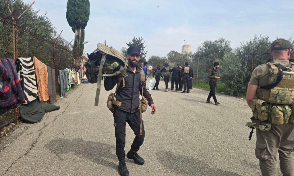 Elements from the Syrian Ministry of Interior during the process of seizing military equipment around Hmeimim Airport in Latakia, western Syria - March 18, 2025 (SANA)