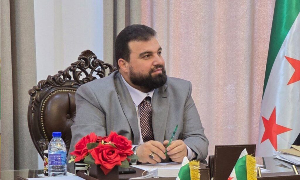 Armed individuals brandished weapons in front of the governor of As-Suwayda, Mustafa al-Bakour, during his presence in the governorate building - May 14, 2025 (As-Suwayda Governorate/Telegram)
