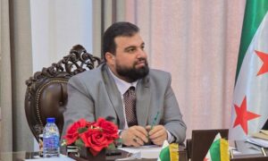 Armed individuals brandished weapons in front of the governor of As-Suwayda, Mustafa al-Bakour, during his presence in the governorate building - May 14, 2025 (As-Suwayda Governorate/Telegram)