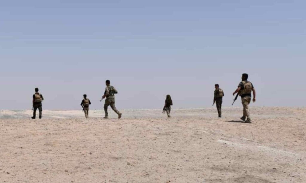 Members of the Syrian Democratic Forces (SDF) during a security operation aimed at pursuing the cells of the Islamic State group in eastern Syria - May 12, 2021 (SDF)