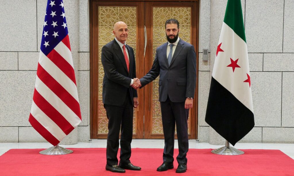 Syrian transitional president Ahmed al-Sharaa alongside US envoy to Syria Thomas Barrack - May 29, 2025 (Syrian Presidency)