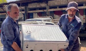 Baniyas Communication Center removes an old phone box at the entrance of the al-Hal market and installs a new one - June 22, 2025 (Tartus governorate)