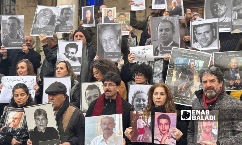 Families of missing persons organize a vigil demanding justice in Damascus, December 27, 2024 (Enab Baladi)