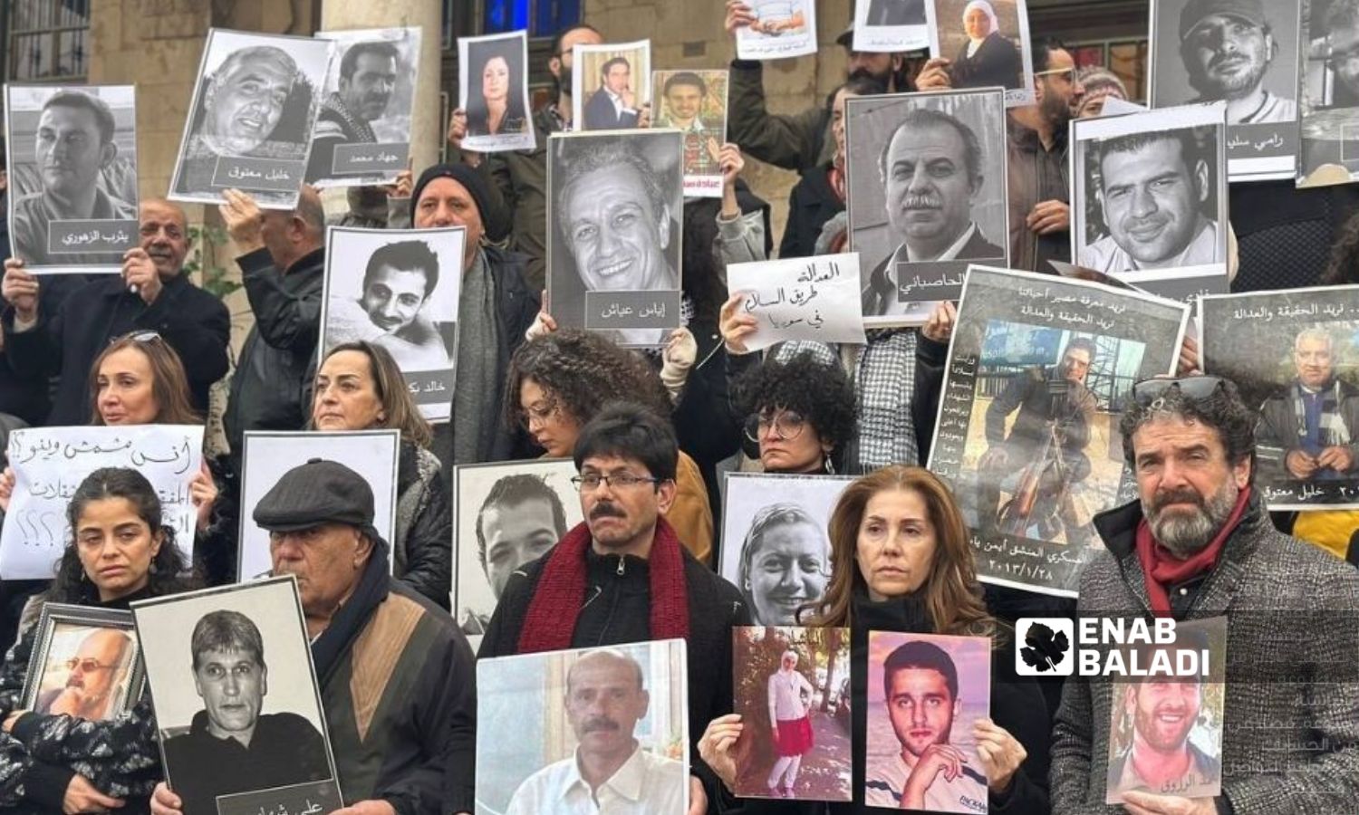 Families of missing persons organize a vigil demanding justice in Damascus, December 27, 2024 (Enab Baladi)