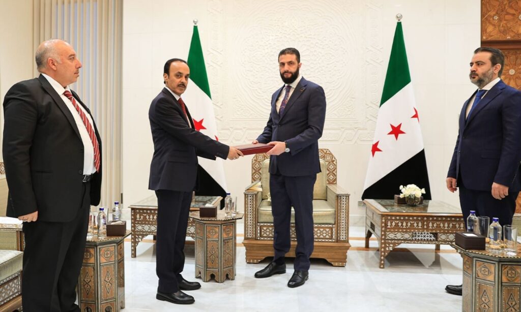 Syrian transitional president Ahmad al-Sharaa receives the final report of the National Committee for Investigation and Fact-Finding – July 20, 2025 (Presidency of the Syrian Arab Republic / Facebook)
