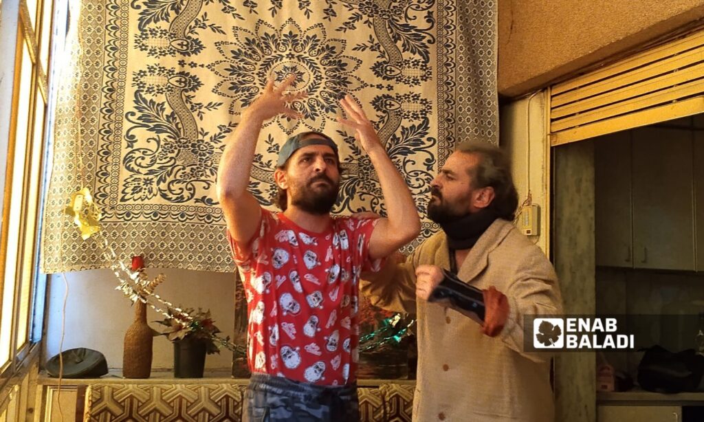 A scene from the play “Kul ‘Aar wa Antum Bikhayr” (Shame on You and Happy Holidays) in Damascus – May 28, 2025 (Enab Baladi/Amir Huquq)