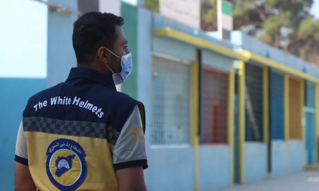 A volunteer from the Syria Civil Defense during his presence at an exam center in Jarablus, eastern Aleppo – 17 July 2025 (Syria Civil Defense)