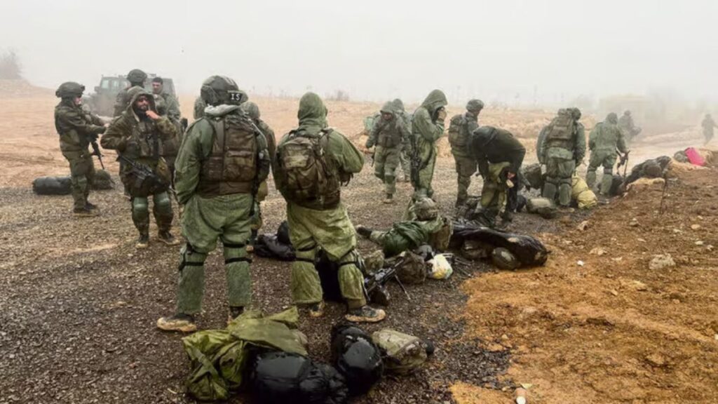 Israeli soldiers pitch tents in preparation for their stay on Mount Hermon, 23 December 2024 (Reuters)
