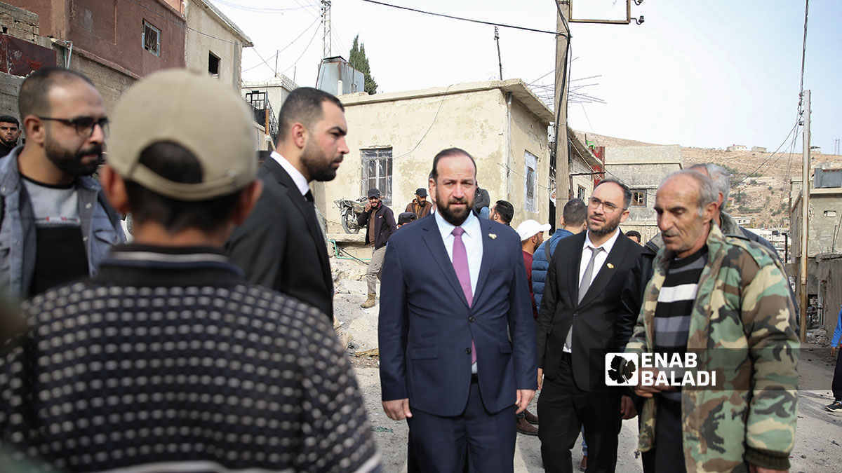 Syrian Minister of Information Hamza al-Mustafa inspects the town of Beit Jinn (southwestern rural Damascus, near the occupied Syrian Golan Heights) following an operation carried out by the Israeli army, (Enab Baladi/Noor Hamza)