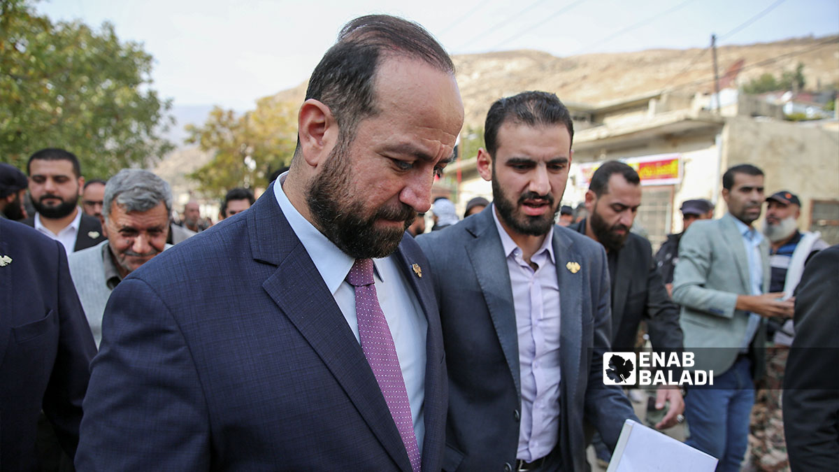 Syrian Minister of Information Hamza al-Mustafa inspects the town of Beit Jinn (southwestern rural Damascus, near the occupied Syrian Golan Heights) following an operation carried out by the Israeli army, (Enab Baladi/Noor Hamza)