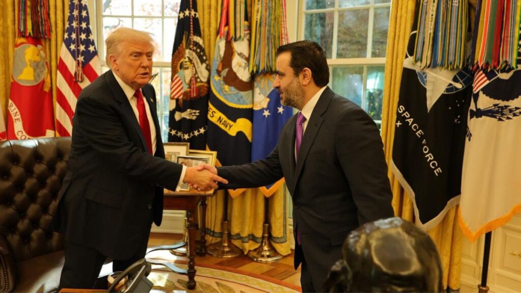 Syrian Foreign Minister Asaad al-Shibani shakes hands with U.S. President Donald Trump while serving on the Syrian delegation to Washington led by President Ahmad al-Sharaa, November 10, 2025, Syrian Foreign Ministry.