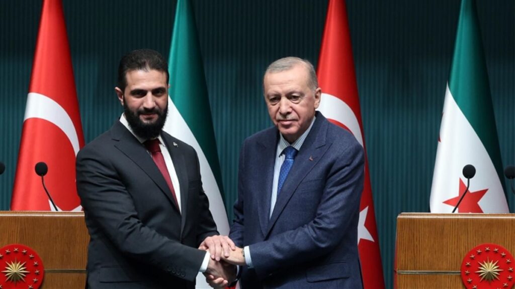 Turkish President Recep Tayyip Erdoğan shakes hands with his Syrian counterpart Ahmad al-Sharaa during the latter’s visit to Turkey, February 5, 2025 (Anadolu Agency)