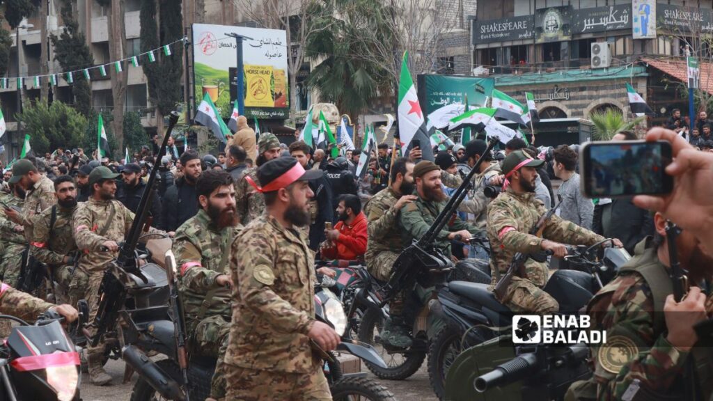Military parade in Homs marking Liberation Day, 8 December 2025 (Enab Baladi / Mohammad Kakhi)