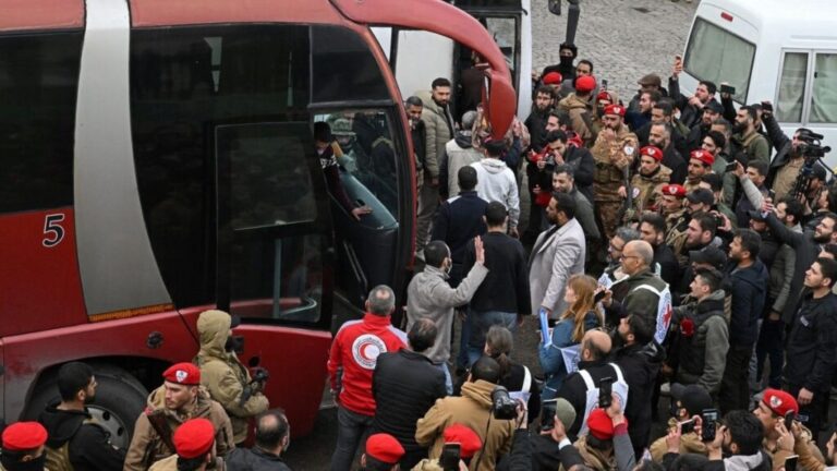 During a detainee exchange between the Syrian government and National Guard factions at the outskirts of Suwayda city in southern Syria, February 26, 2026 (AFP/Louai Beshara)