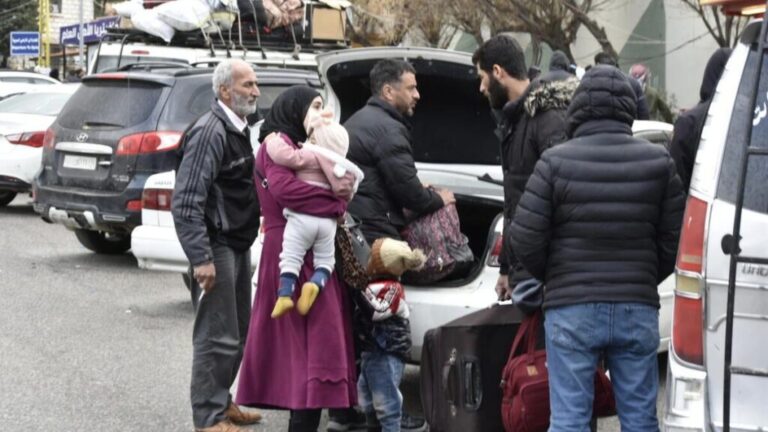 A Syrian family arrives at the Masnaa border crossing in Lebanon to cross into Syria while fleeing ongoing Israeli bombardment, March 6, 2026 (UNHCR).