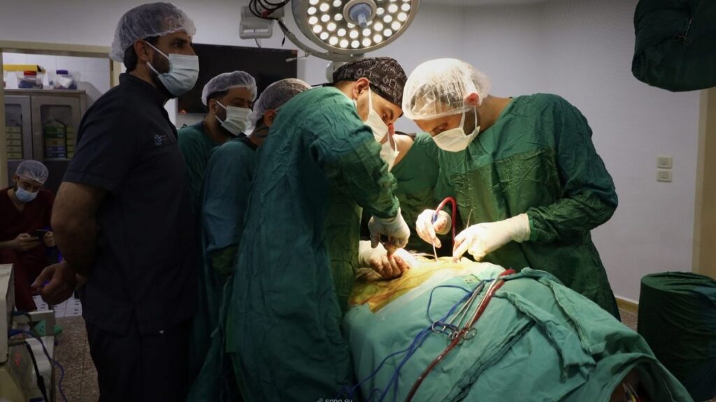 Syrian doctors living in Germany perform spinal surgeries on patients at Idlib University Hospital, April 6, 2026. (SANA)