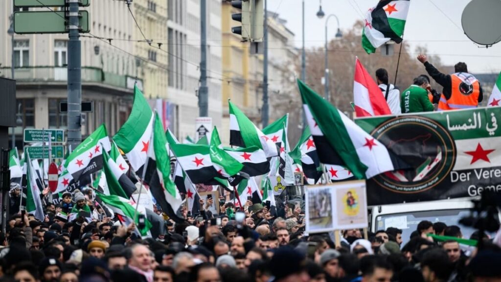 Syrians celebrate the fall of the regime in Austria, December 15, 2024. (CNN)