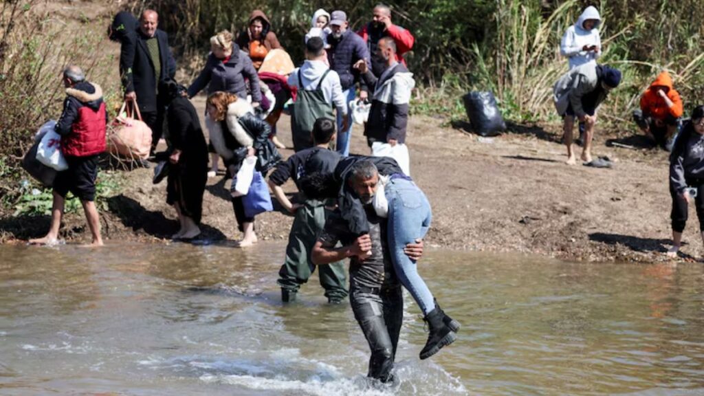 Syrians flee toward Lebanon after the events of March 2025, March 11, 2025. (Reuters)