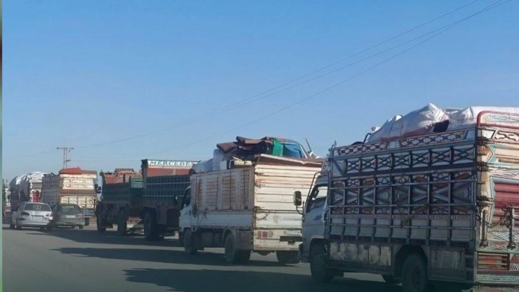 Trucks carrying displaced people from al-Hasakah to the Afrin area in Aleppo countryside, May 9, 2026. (al-Hasakah Media Directorate)