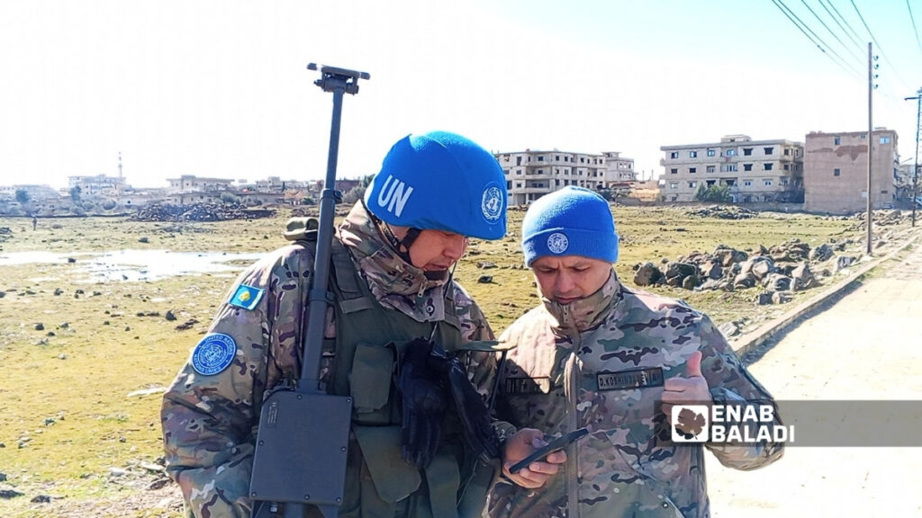 Members of United Nations monitoring forces searching for mines at the eastern entrance to Khan Arnabeh in Quneitra countryside, 19 January 2026. (Enab Baladi/Abdullah al-Wanny)