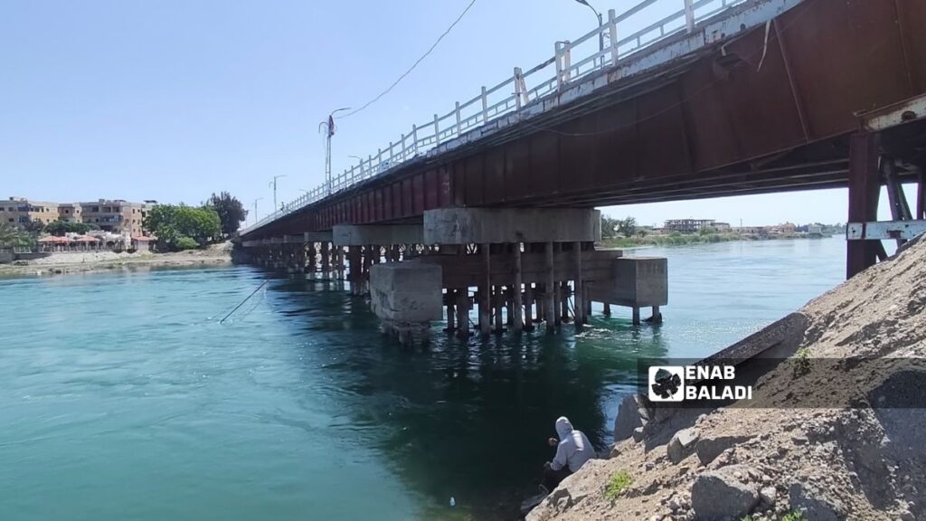 Raqqa’s old bridge, al-Mansour, over the Euphrates River in Raqqa province, April 27, 2026. (Enab Baladi, Ahmad al-Hamadi)