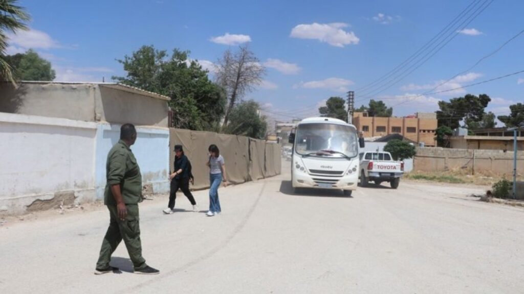 A bus carrying SDF women fighters released by the Syrian government, June 1, 2026 (Hawar)