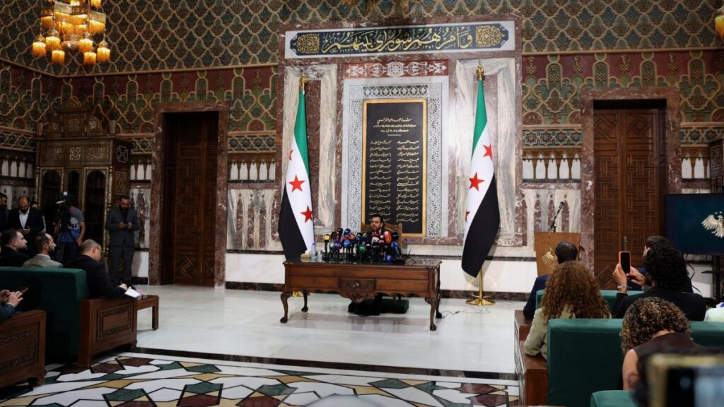 Head of the Higher Committee for People’s Assembly Elections Mohammad Taha al-Ahmad holds a press conference to announce the members appointed by Syrian President Ahmed al-Sharaa, 2 July 2026. (SANA)