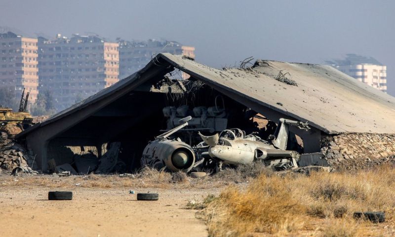 A concrete hangar at Mezzeh Military Airport in Damascus hit by Israeli aircraft, December 9, 2024 (AFP)