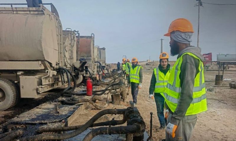 Workers in front of gas pumping pipelines at Syria’s al-Jabsa fields, January 24, 2026 (SANA).