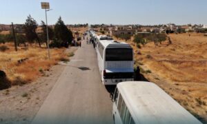 Buses transported Suwayda students from Rural Damascus to al-Surah al-Sughra to sit their primary and secondary education certificate exams, August 29, 2026. (al-Ikhbariya)