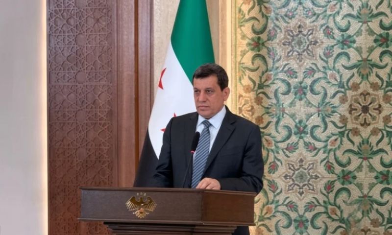 Mazloum Abdi announces the dissolution of the SDF and the Autonomous Administration during a conference at the People's Palace in Damascus, August 25, 2026. (al-Ikhbariya)
